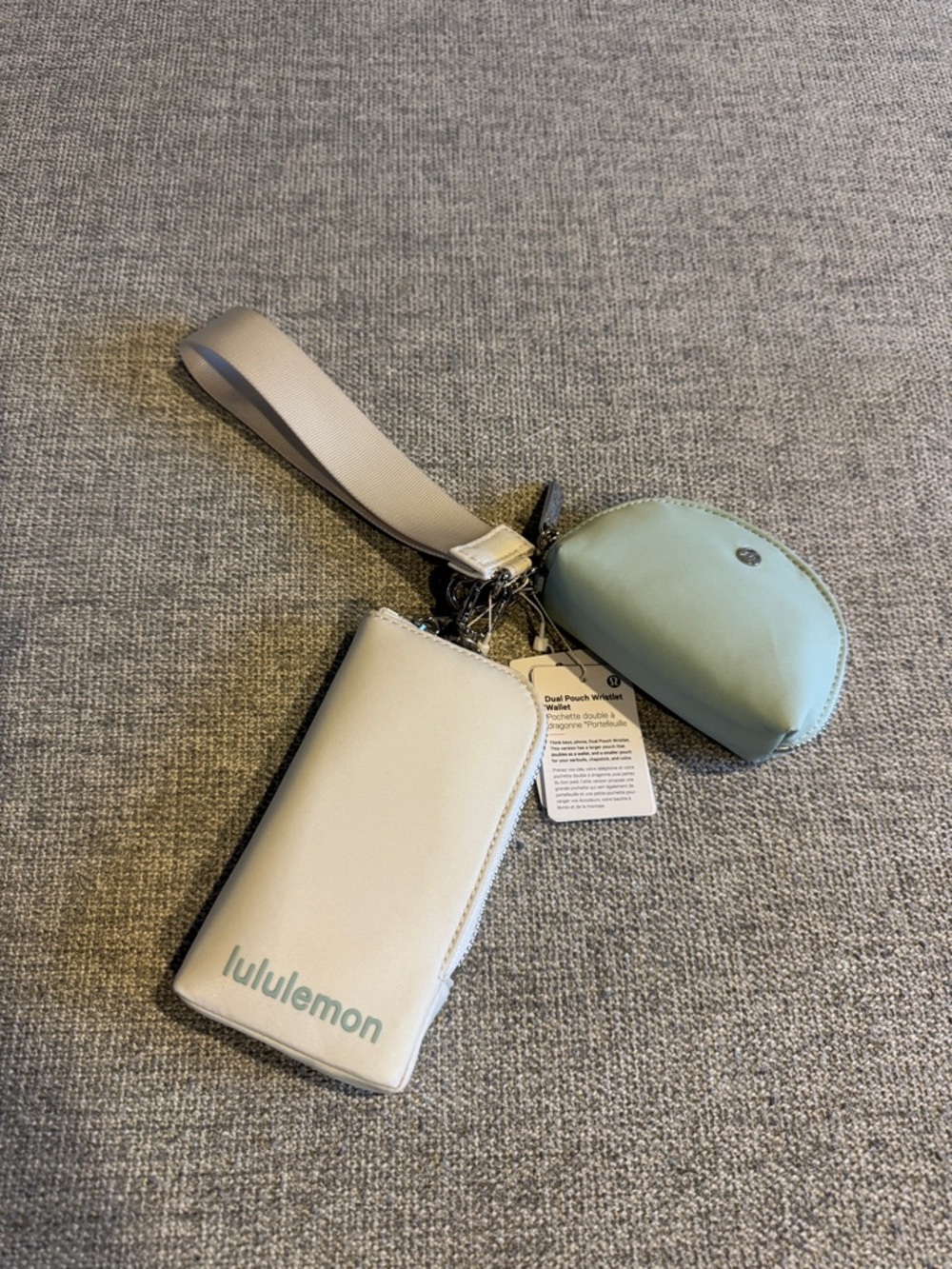 NWT. Lululemon Dual Ivory Light Aqua Silver Keychain Wristlet Set